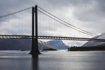 Classic Norwegian cold panoramic landscape of Efjorden fjord, Ballangen municipality, Nordland county, Ofoten district, Norway with Efjord Bridges, Stortinden mountain, Northern Norway