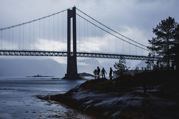 Classic Norwegian cold panoramic landscape of Efjorden fjord, Ballangen municipality, Nordland county, Ofoten district, Norway with Efjord Bridges, Stortinden mountain, Northern Norway