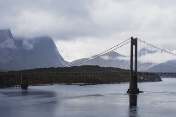 Classic Norwegian cold panoramic landscape of Efjorden fjord, Ballangen municipality, Nordland county, Ofoten district, Norway with Efjord Bridges, Stortinden mountain, Northern Norway