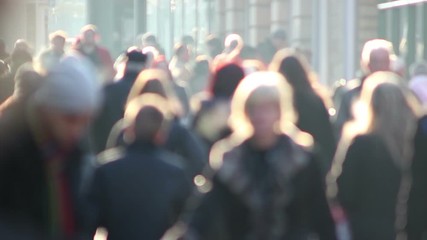 Anonymous / Unrecognisable People walking in the city. They are shopping and walking down the high street. Blurred on purpose - Powered by Adobe