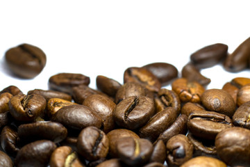 Coffee beans background, roasted coffee beans on a white background, space for text.