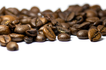 Coffee beans background, roasted coffee beans on a white background, space for text.