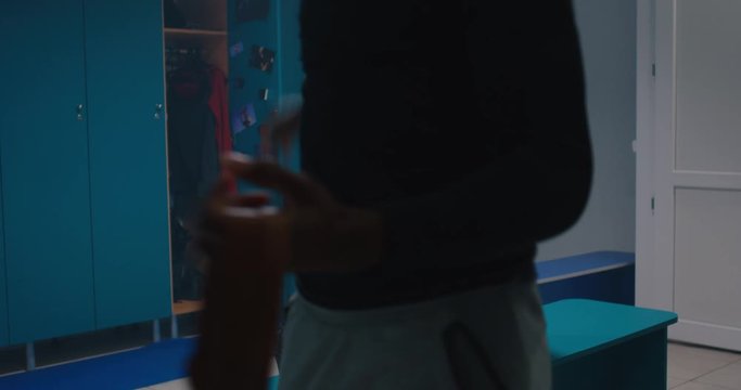 Fist fighting in locker room