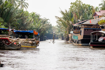 Fototapeta na wymiar Rural sights along the Ben Tre river and canals in Vietnam's Mekong Delta