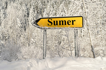 road sign arrow pointing to summer