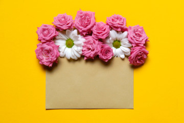 Reusable eco envelop used to store green colourful flowers
