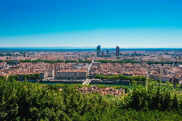 Lyon panorama elevated view on sunny day. Aerial panoramic view of Lyon with the skyline. Top view of Lyon cityscape with Pont Marechal Juin and Rhone river from Fourviere Hill