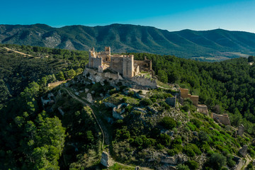 Obraz premium Aerial panorama view of Alcala de Xivert (Alcalá de Chivert) medieval Templar knight castle ruins in Valencia province Spain