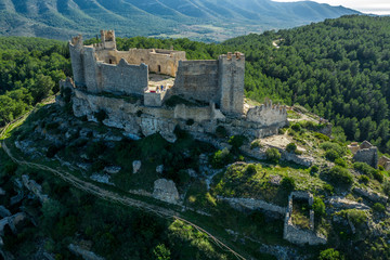 Aerial panorama view of Alcala de Xivert (Alcalá de Chivert) medieval Templar knight castle ruins in Valencia province Spain