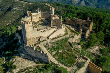 Aerial panorama view of Alcala de Xivert (Alcalá de Chivert) medieval Templar knight castle ruins...