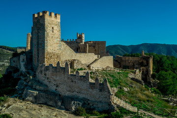 Fototapeta na wymiar Aerial panorama view of Alcala de Xivert (Alcalá de Chivert) medieval Templar knight castle ruins in Valencia province Spain