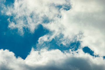 White clouds in a blue sky