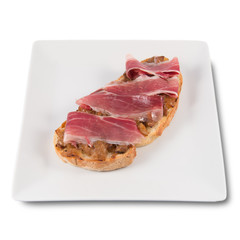 A toast of boletus and iberian ham