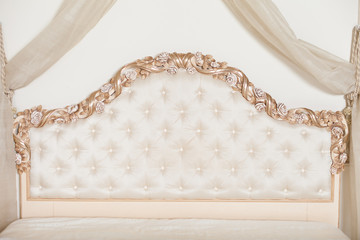 Beige beautiful bedhead. Luxury bedroom