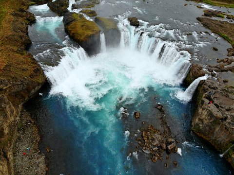The aerial view of the beautiful blue waterfall of Godafoss, Iceland in the summer