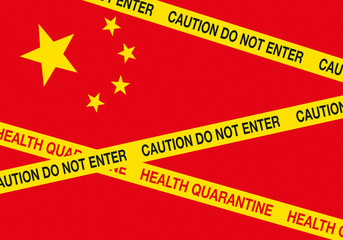 Coronavirus threat from China. Chinese flag with yellow barricade tape saying Caution do not enter and Health Quarantine. Concept image illustration.