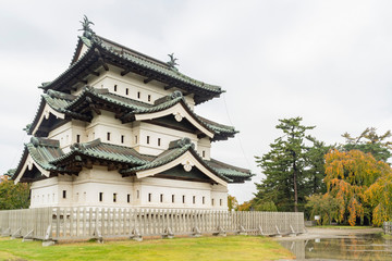 Fototapeta na wymiar Exterior view of the Hirosaki Castle with beautiful fall color