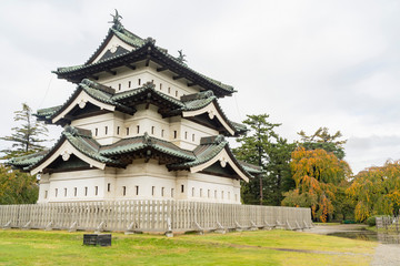 Fototapeta na wymiar Exterior view of the Hirosaki Castle with beautiful fall color