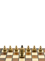 Obraz na płótnie Canvas Leadership Concept: White King Chess Piece With Pawns On A Wooden Chess Board, White Background