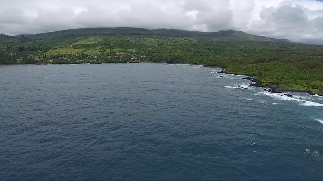 Hana Bay on island of Maui, Hawaii, Aerial Pan Right to Left