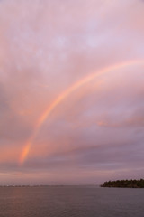 Fototapeta na wymiar Sunrise and a rainbow in Morehead, North Carolina