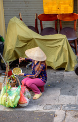 Street vendor cooks food, Old Quarter Hoan Kiem District, Hanoi 