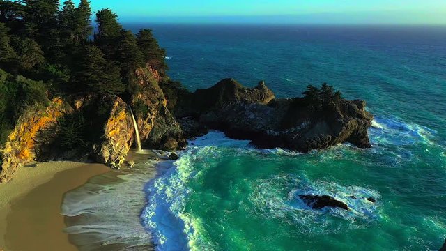 Aerial view of Julia Pfeifer State Park waterfall - fresh water into the Pacific Ocean off Pacific Coast Highway, Route 2