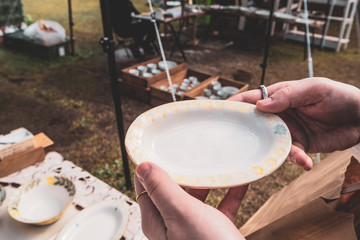 I bought pottery at an outdoor market.