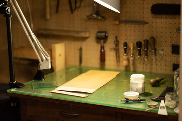 Working space and tools for leather craftsmen.