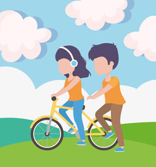 woman with headphones riding bike and man walk