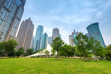 Obraz premium city park with modern building background in shanghai