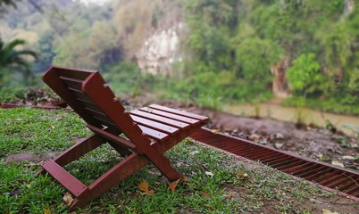 Wooden Chair / bench in the park