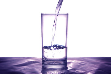 Clean water for good health. Pouring Fresh Pure Water From Pitcher Into A Glass on table wooden. Health And Diet Concept. Lifestyle Healthcare And Beauty.