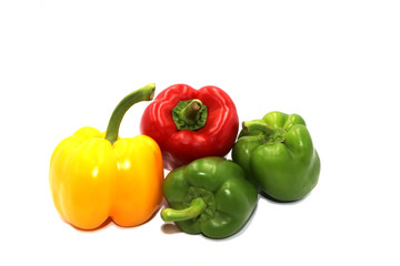 Sweet peppers, colorful vegetables placed on a white background