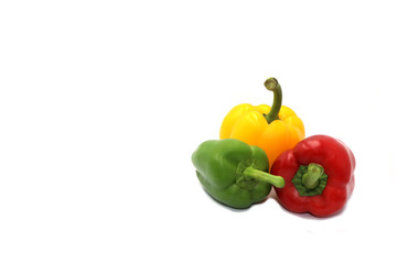 Sweet peppers, colorful vegetables placed on a white background