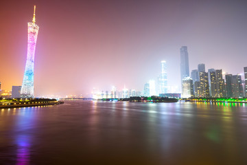 night skyline and modern cityscape in guangzhou at riverside