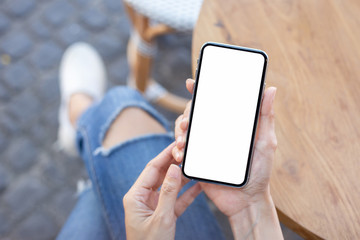 Mockup image blank white screen cell phone.hand holding texting using mobile background empty space for advertise text.people contact marketing business,technology 