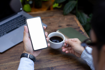 cell phone Mockup image blank white screen.man hand holding texting using mobile.background empty space for advertise text.people contact marketing business,technology 