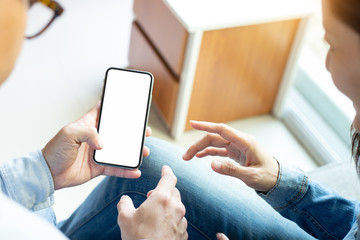 Mockup image blank white screen cell phone.hand holding texting using mobile background empty space for advertise text.people contact marketing business,technology 