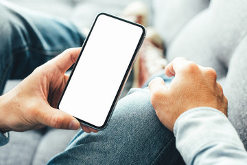 Mockup image blank white screen cell phone.hand holding texting using mobile background empty space for advertise text.people contact marketing business,technology 