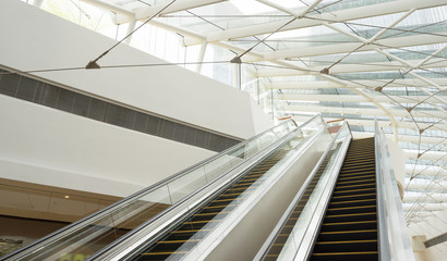 Obraz premium escalator,Up and down escalators in public building.