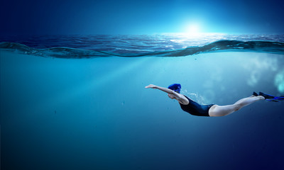 Swimmer in flippers. Mixed media