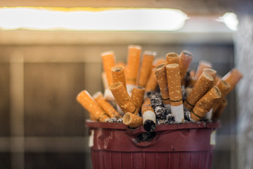 Many cigarettes on the ashtray