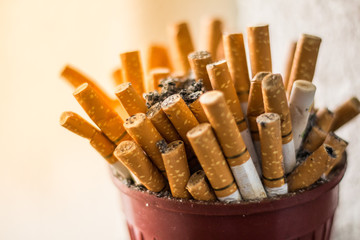 Many cigarettes on the ashtray