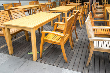 Fototapeta na wymiar Wooden table in the outdoor coffee room