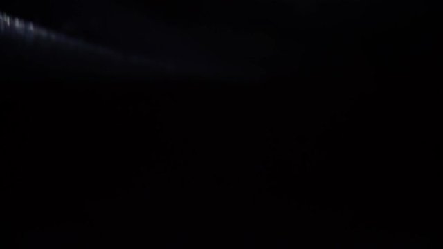 Drill bit roll up transition over black background