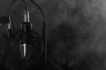 Studio Microphone isolated on a white background. Smoke banner