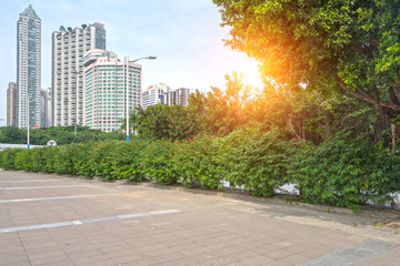 empty, modern square and skyscrapers in modern city