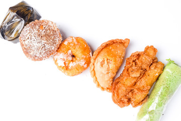 Flatlay of Nusantara dessert on white background.