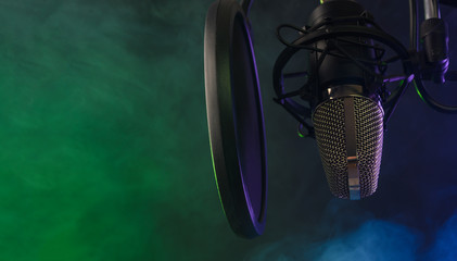 studio condenser microphone with pop-filter and anti-vibration mount with backlight, color purple...